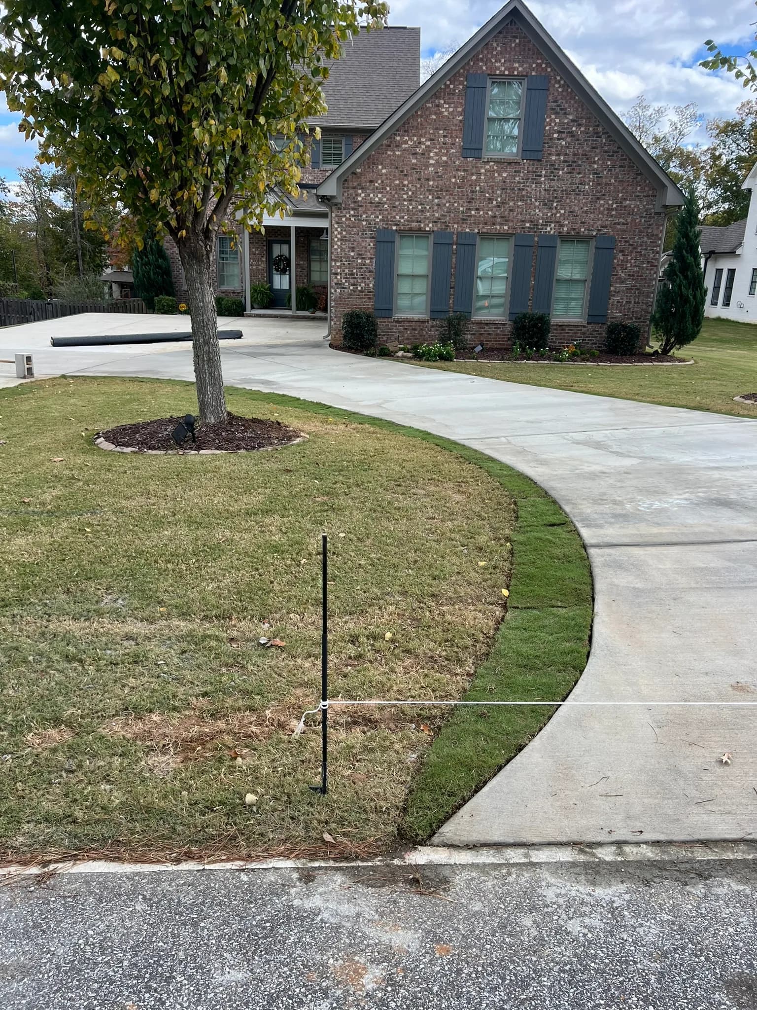 Driveway and Sod Installation Project — photo 8